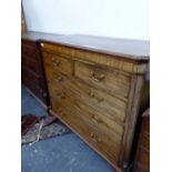 AN EARLY 19th C. MAHOGANY CHEST WITH A HERRING BONE LINE INLAID ABOVE THE TWO SHORT AND THREE GRADED