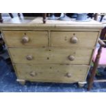 A VICTORIAN PINE CHEST OF TWO SHORT AND TWO LONG DRAWERS ON SPINDLE FEET. W 87.5 x D 45 x H 82cms.
