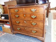 AN 18th C. OAK CHEST OF TWO SHORT AND THREE GRADED LONG DRAWERS ON SHAPED BRACKET FEET. W 84.5 x D