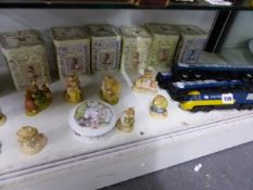 A QUANTITY OF BEATRIX POTTER FIGURINES AND BOXES, TOGETHER WITH TWO TRIANG STOCK TRAINS, A HORNBY