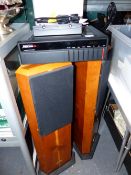 A MERIDIAN 551 AMPLIFIER TOGETHER WITH A PAIR OF FLOOR STANDING YEW WOOD CASED SPEAKERS.