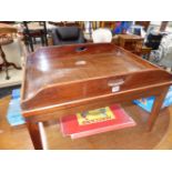 A 19th C. MAHOGANY BUTLERS TRAY LATER MOUNTED ON TAPERING SQUARE LEGS AS A COFFEE TABLE