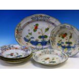 A SET OF FIVE ITALIAN MAIOLICA SOUP PLATES PAINTED WITH CENTRAL FLOWERS AND WITH FOUR SPRAYS ON EACH
