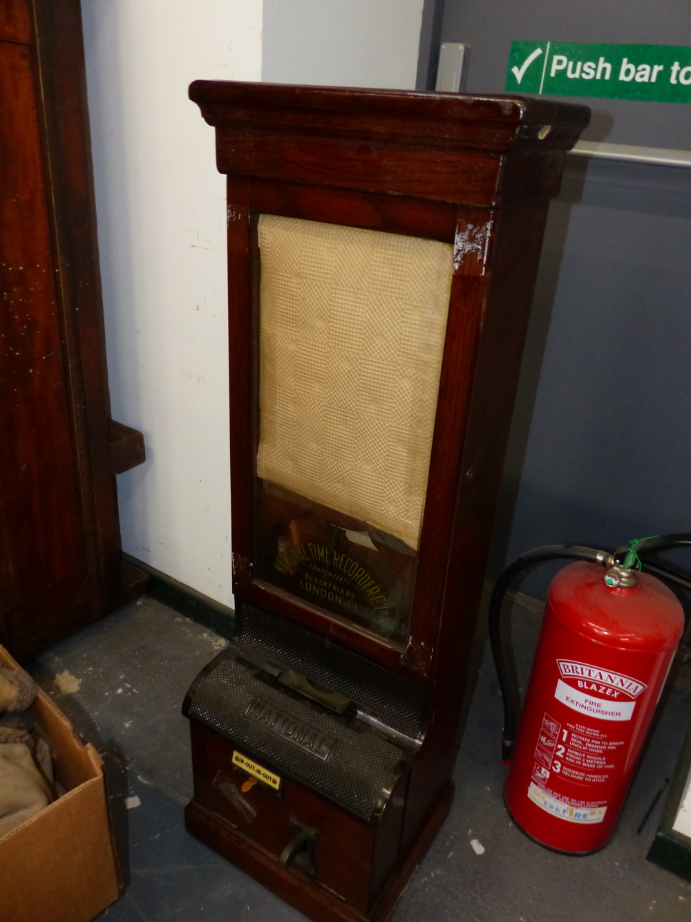 A NATIONAL TIME RECORDER OAK CASED CLOCKING IN CLOCK