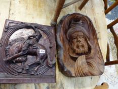 TWO CARVED HARDWOOD WALL PLAQUES.