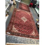 A PERSIAN HAMADAN CARPET. 320 x 212cms