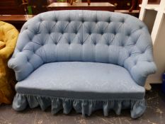 A VICTORIAN TWO SEAT SETTEE BUTTON UPHOLSTERED IN BLUE DAMASK. W 144cms.