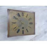 AN ARTS AND CRAFTS SHELF CLOCK STRIKING ON A BELL, THE WEIGHT DRIVEN MOVEMENT WITH A SQUARE BRASS D