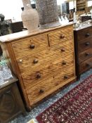 A VICTORIAN SATIN BIRCH CHEST OF DRAWERS