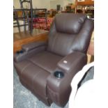 A BROWN LEATHERETTE ARMCHAIR WITH REMOTE TO CONTROL THE ELECTRIC RECLINING