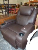 A BROWN LEATHERETTE ARMCHAIR WITH REMOTE TO CONTROL THE ELECTRIC RECLINING