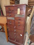 A 19th C. MAHOGANY COLLECTORS CHEST OF TWO BANKS OF SIX SHORT DRAWERS OVER FIVE LONG DRAWERS AND THE