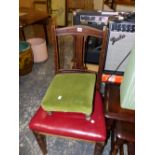 A LATE VICTORIAN OAK DINING CHAIR WITH A RED LEATHER SEAT TOGETHER WITH A FOOTSTOOL