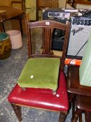 A LATE VICTORIAN OAK DINING CHAIR WITH A RED LEATHER SEAT TOGETHER WITH A FOOTSTOOL