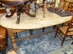 A PINE OVAL PLANK TOPPED TABLE ON TURNED LEGS JOINED BY AN H-SHAPED STRETCHER. W 200 x D 114 x H