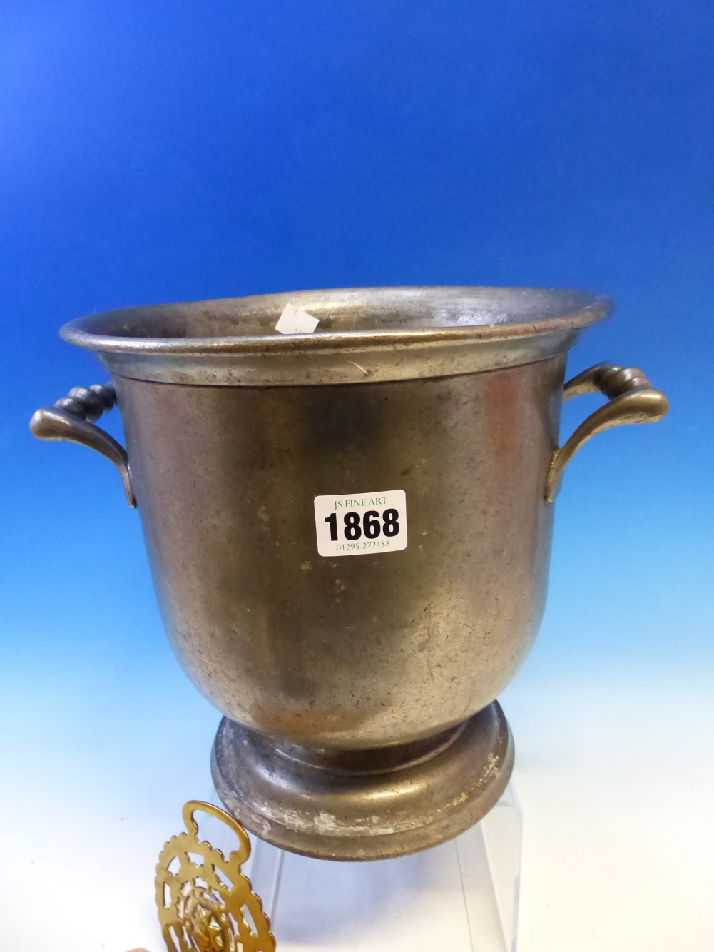 A PEWTER TWO HANDLED WINE BUCKET. H 23cms. A HORSE BRASS, A PAIR OF WOODEN BUTTER PADDLES AND TWO - Image 7 of 8