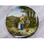 A DOULTON LAMBETH CIRCULAR WALL PLAQUE PAINTED WITH A MOTHER AND TWO CHILDREN FEEDING CHICKENS AT A