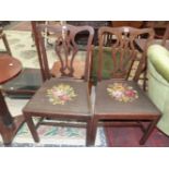 A PAIR OF 19th C. OAK CHIPPENDALE TASTE DINING CHAIRS WITH FLORAL NEEDLE WORK DROP IN SEATS ABOVE