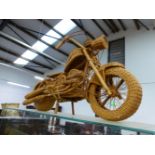 A HANDMADE RATTAN MOTORCYCLE.