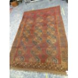 AN ANTIQUE AFGHAN BOKHARA CARPET 386x261cms