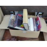 A BOX OF VARIOUS BOOKS.