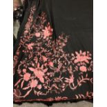 A CHINESE BLACK SILK SHAWL SEWN WITH PINK FOLIAGE AND FLOWERS