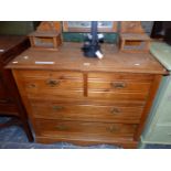 AN EARLY 20th C. PINE MIRROR BACKED DRESSING CHEST OF TWO SHORT AND TWO LONG DRAWERS. W 94 x D 45
