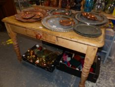 A PINE TABLE WITH A DRAWER TO ONE LONG SIDE ABOVE TURNED LEGS. W 113 x D 74 x H 74cms.