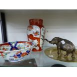 A JAPANESE BOWL AND A VASE, AN EASTERN BRASS PLATE AND AN ORIENTAL ELEPHANT FIGURE