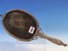 A SILVER FILIGREE HAND MIRROR, POSSIBLY BOSNIAN OR HERZOGOVINAN, THE DOUBLE SIDED PLATE OVAL, THE