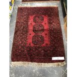 TWO AFGHAN RUGS 136x102 AND 150x104cms