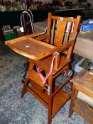 A MODERN CHILDS HIGH CHAIR