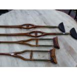 FOUR PAIRS OF ANTIQUE WOODEN CRUTCHES
