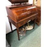 A LATE 19th/EARLY 20th C. MARQUETRIED MAHOGANY CYLINDER BUREAU, THE LID WITH VASE OF FLOWERS OVAL ON