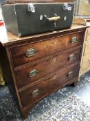 A GEORGE III CROSS BANDED AND LINE INLAID MAHOGANY CHEST OF THREE LONGDRAWERS ON BRACKET FEET. W