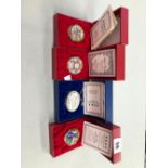 FOUR HALCYON DAYS ENAMEL BOXES WITH ORIGINAL OUTERS.