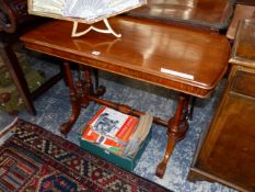 A VICTORIAN FRUITWOOD SIDE TABLE, THE NARROW ENDS OF THE TOP ROUNDED ABOVE PAIRS OF COLUMNS