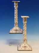 A PAIR OF EARLY 19th C. WHITE ENAMEL CANDLESTICKS, POSSIBLY STAFFORDSHIRE, THE SPIRAL COLUMNS AND