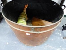 A LARGE COPPER LOG BIN.