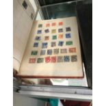 A COLLECTION OF LOOSE STAMPS AND ALBUMS ETC.