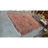 AN ANTIQUE PERSIAN HERIZ CARPET 337x254cms