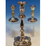 A PAIR OF 20th C. BIRMINGHAM SILVER DWARF CANDLESTICKS ON REEDED CIRCULAR FEET. H 10cms. TOGETHER