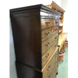A GEORGE III MAHOGANY CHEST ON CHEST WITH TWO SHORT DRAWERS ABOVE SIX GRADED LONG DRAWERS AND
