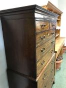 A GEORGE III MAHOGANY CHEST ON CHEST WITH TWO SHORT DRAWERS ABOVE SIX GRADED LONG DRAWERS AND