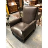 A LATE VICTORIAN PATENT ADJUSTABLE ARMCHAIR CLOSE NAILED UPHOLSTERED IN BROWN LEATHER, RECLINING