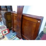 A EMPIRE FRENCH MAHOGANY BED, ONE SIDE OF THE BED ENDS WITH ORMOLU MOUNTS TO THE CYLINDRICAL