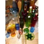 VARIOUS COLOURED ART GLASS BOTTLES, JUGS ETC.