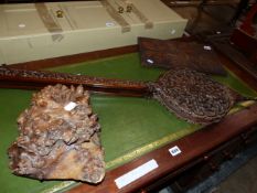 A PAIR OF CRVED WOOD FIRE BELLOWS, A PANEL CARVED WITH CHESTNUT LEAVES AND A NODULE OF BURR WOOD