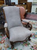 A 19th C. MAHOGANY SHOW FRAME ARMCHAIR, THE ARMS SCROLLING AT THE FRONT ABOVE THE SERPENTINE FRONTED