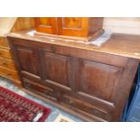 AN 18th C. OAK MULE CHEST, THE THREE PANELLED FRONT OVER TWO DRAWERS. W 123 x D 52 x H 80cms.